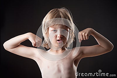 Boy Showing his Muscles