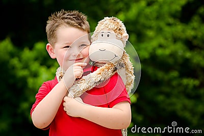 Boy with stuffed animal