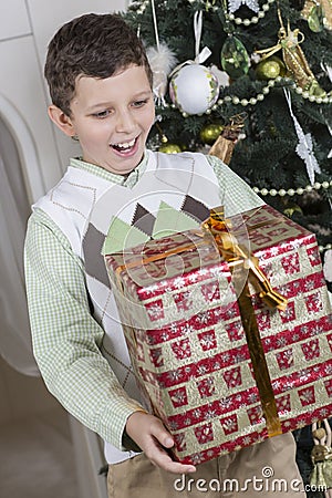 Boy is surprised with a big Christmas gift
