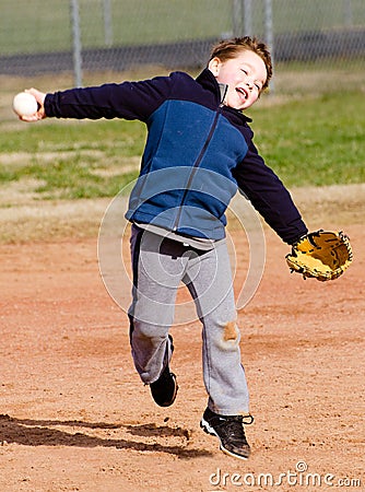 Boy throwing baseball