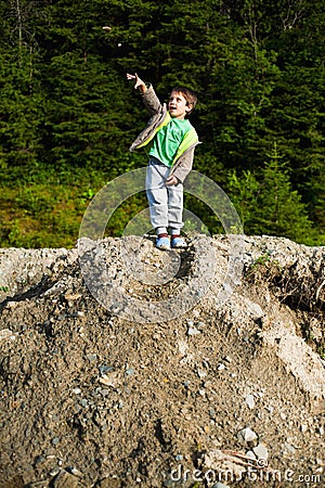 Boy throwing rock