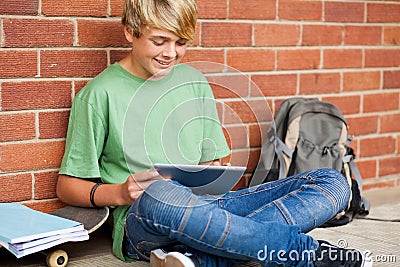 Boy using tablet computer