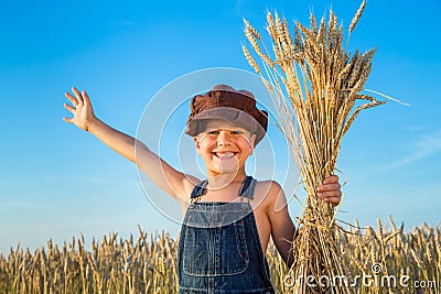 Boy on wheat field