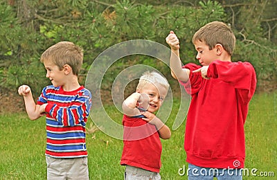 Boys Showing off Muscles