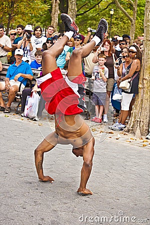 Brake dancer at an open air performance in Battery Park, New York