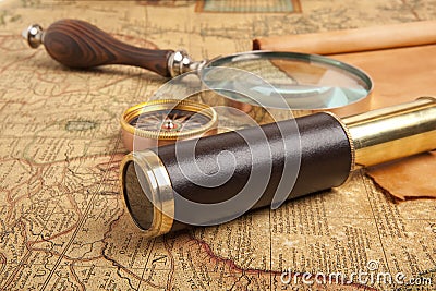 Brass telescope on map