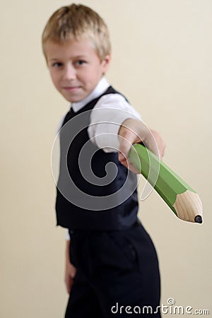 Brave schoolboy with pencil