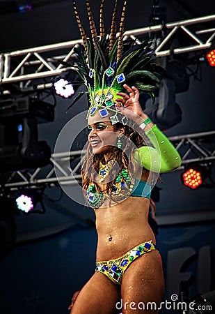 Brazilian samba dancer on a stage sensually moving