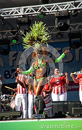 Brazilian samba dancer on a stage sensually moving