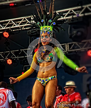 Brazilian samba dancer on a stage sensually moving