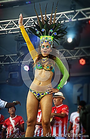 Brazilian samba dancer on a stage sensually moving