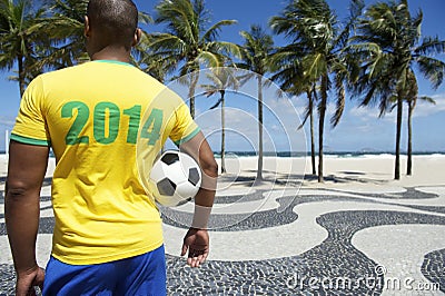 Brazilian soccer football player wears 2014 shirt Rio