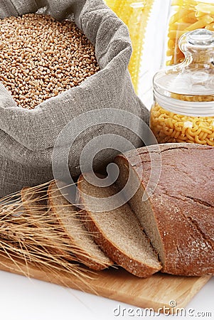 Bread, bag with wheat and macaroni in the containe