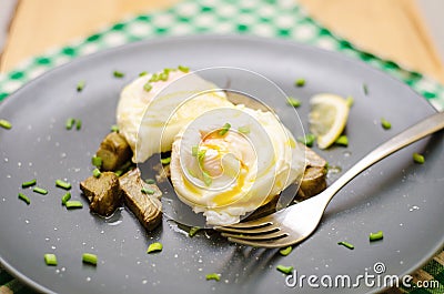 Breakfast with poached eggs and artichokes