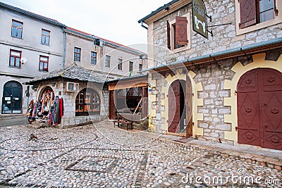 Brick road street with small touristic shops at ra