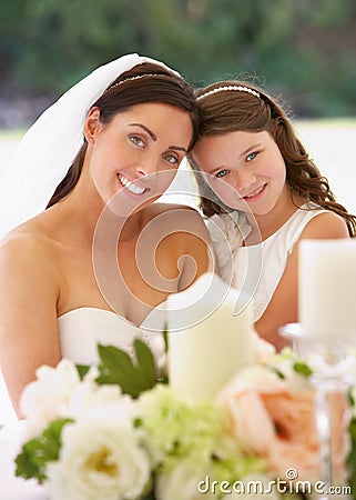 Bride With Bridesmaid In Marquee At Reception