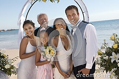 Bride and Groom with family on beach (portrait)