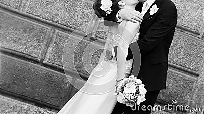 Bride and groom kiss