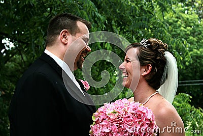 Bride and groom laughing