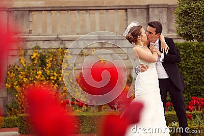 Bride and groom love roses