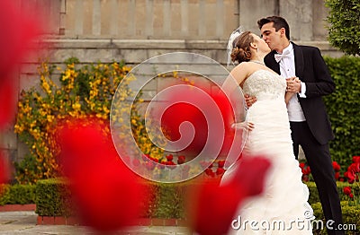 Bride and groom love roses