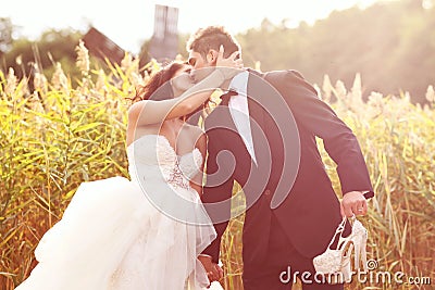 Bride and groom at sunset