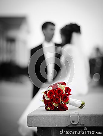 Bride, groom and wedding bouquet