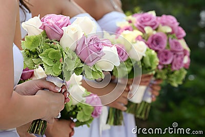 Bridesmaids holding bouquets