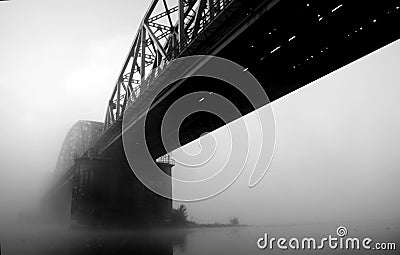 Bridge disappearing in fog