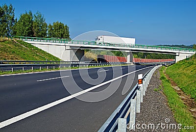 Bridge over empty highway in the countryside