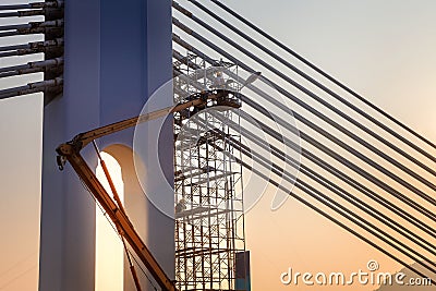 Bridge repair on at sunset