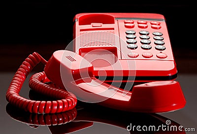 Bright red desk telephone