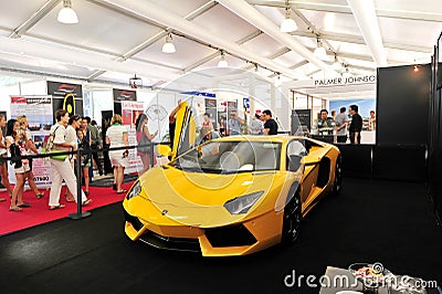 Bright yellow Lamborghini Aventador on display at the Singapore Yacht Show 2013