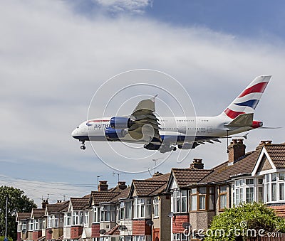 British Airways Airbus A380 plane landing over houses