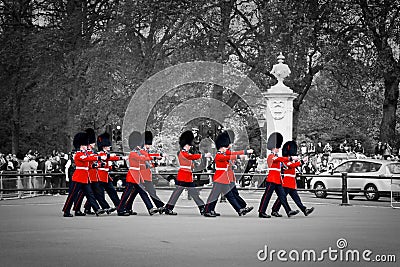 British Royal guards perform the Changing of the Guard in Buckingham Palace