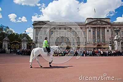 British Royal guards perform the Changing of the Guard in Buckingham Palace