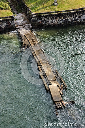 Broken bridge near the water