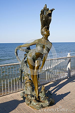 Bronze sculpture of a mermaid