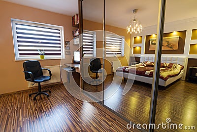 Brown master bedroom interior