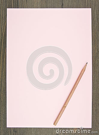 Brown pencil on pink paper