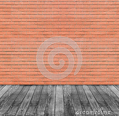 Brown red brick wall and black wooden floor