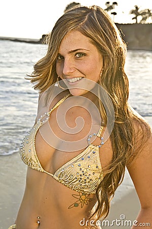 Brunette Woman in Bikini on Beach close up