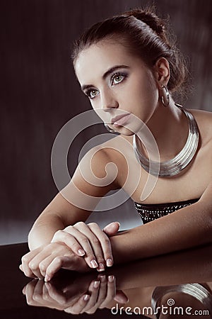 Brunette woman with silver jewellery