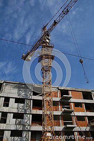 Building and Crane on construction yard