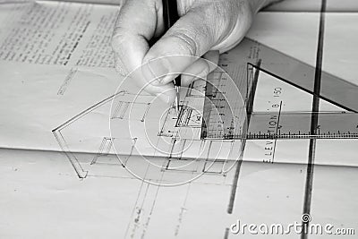 Building plans being drawn B