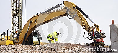 Bulldozer and workers in action