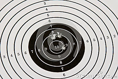 bulls-eye-target-bullet-holes-15932686.jpg