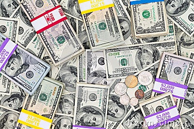 Bundles of different denomination dollar bills