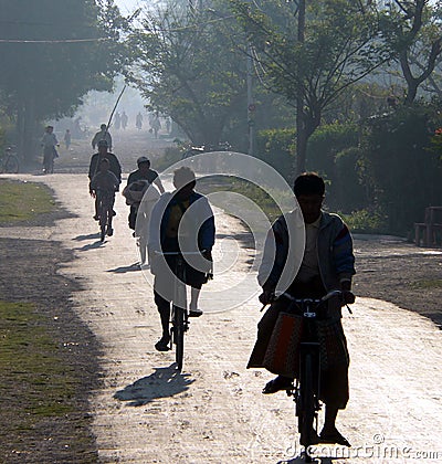 Burmese cycling to work & school