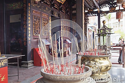 Burning Joss Sticks at Chinese Temple